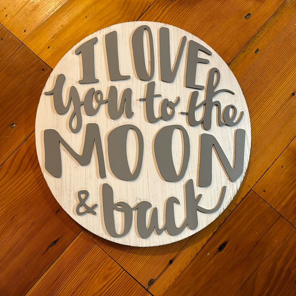 I love you to the moon and back nursery sign